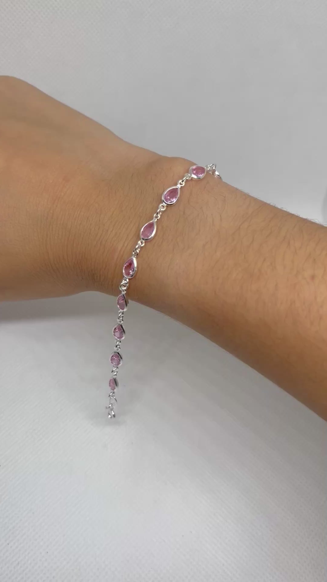 Pulseira com zircônias rosa